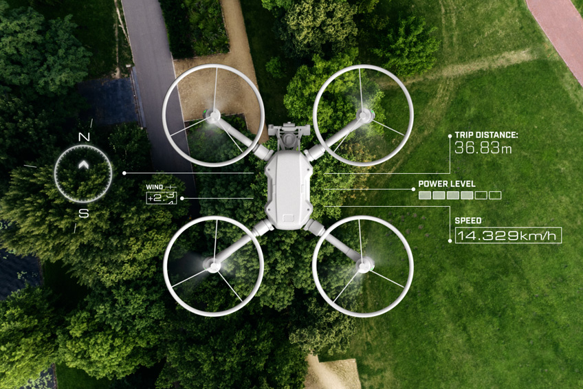 Drone close up over green field.