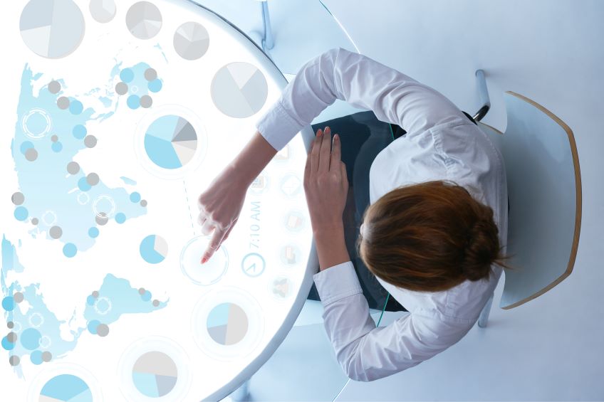 Woman at a lighted data point table