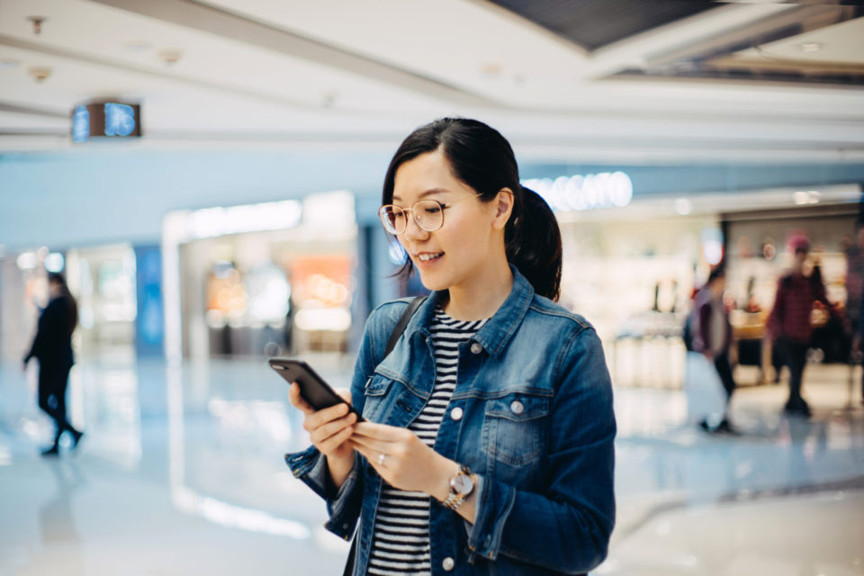 Young woman using smartphone