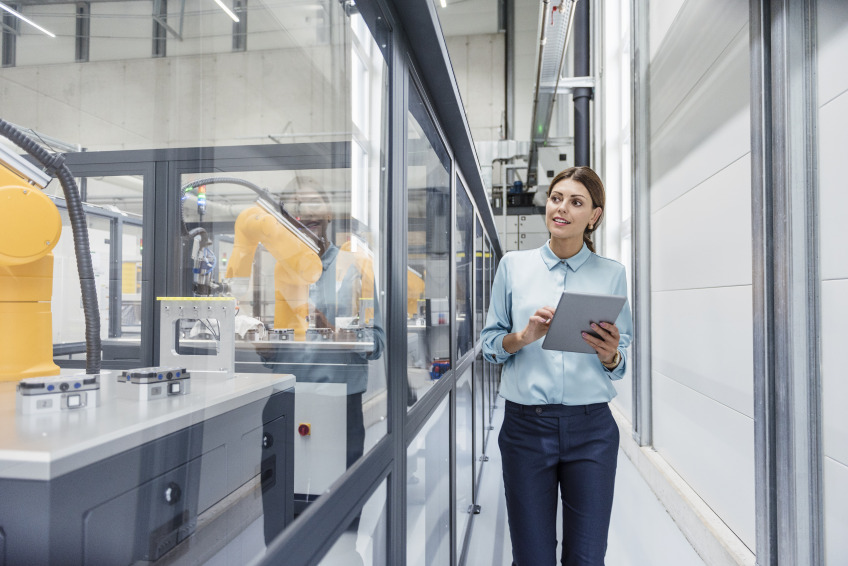 woman in lab with notepad